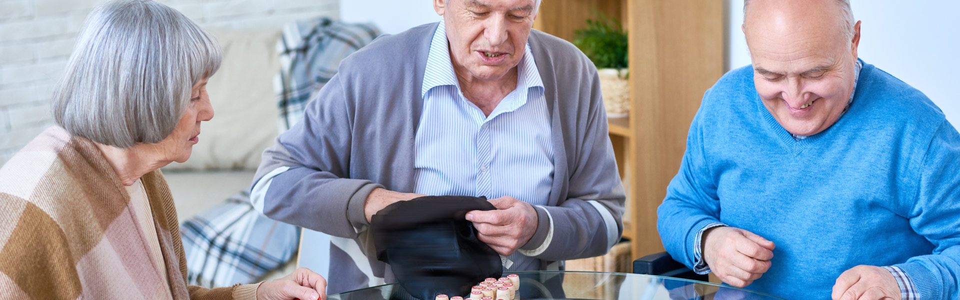 three seniors playing bingo