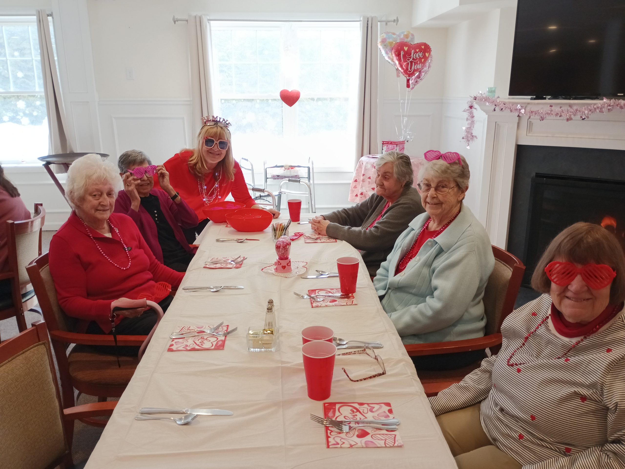 Table with food and people sitting