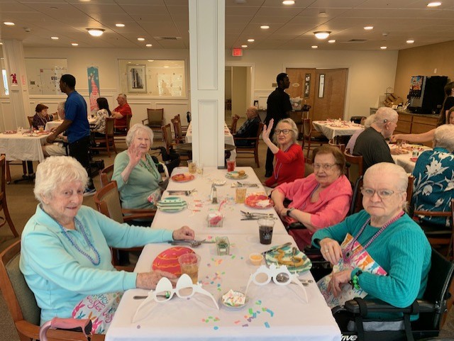 Elder people dining at hall